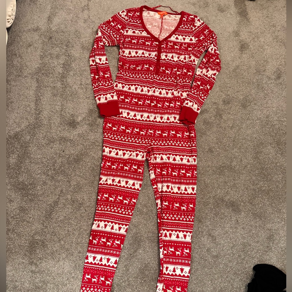 Brand new women’s size small onesie